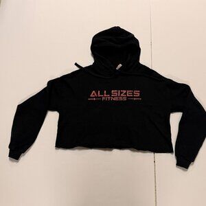 Bella Canvas cropped hoodie bears the inscription"ALL SIZES FITNESS" in bright r
